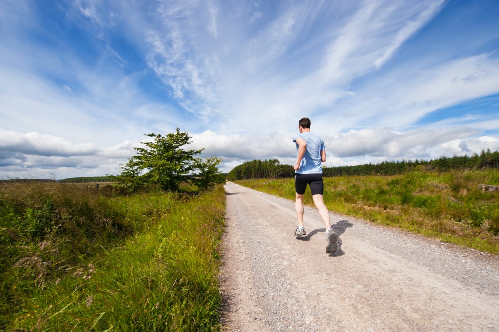 man running in the countryside