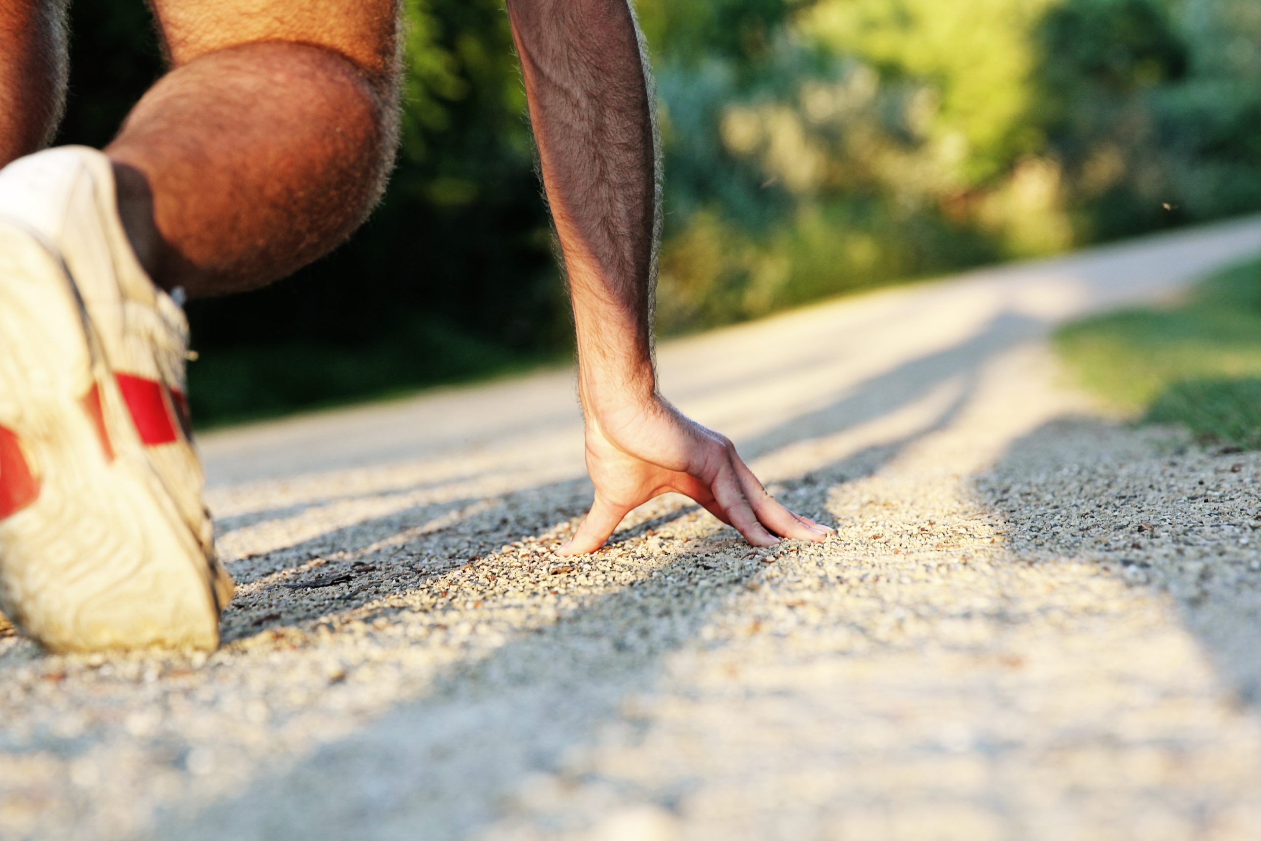 New year goals. A person about to run along a path